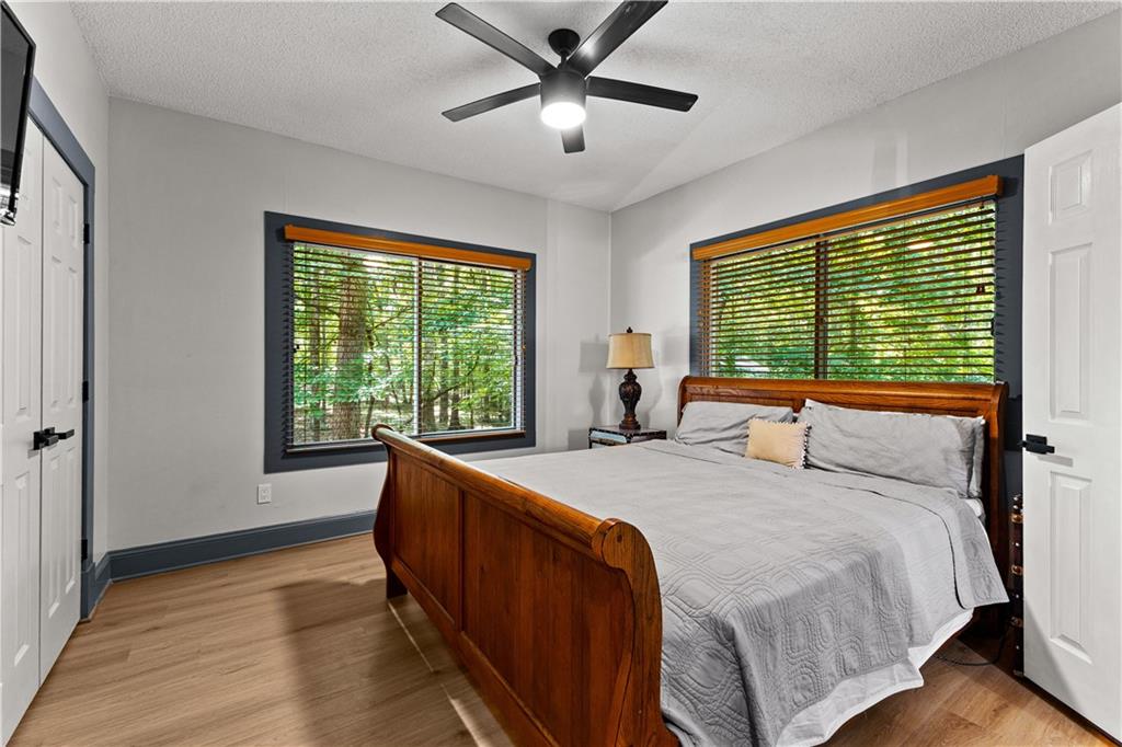 394 Ferrell-Tatum Road LaGrange, GA 30240 - Photo 35 of 68 a bedroom with a large bed and a large window