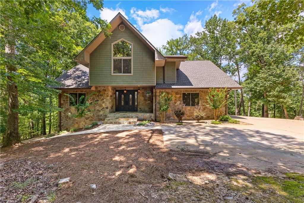 394 Ferrell-Tatum Road LaGrange, GA 30240 - Photo 56 of 68 a front view of a house with a yard and garage