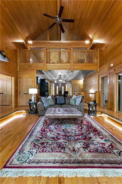 394 Ferrell-Tatum Road LaGrange, GA 30240 - Photo 8 of 68 a large living room with lots of furniture and a rug