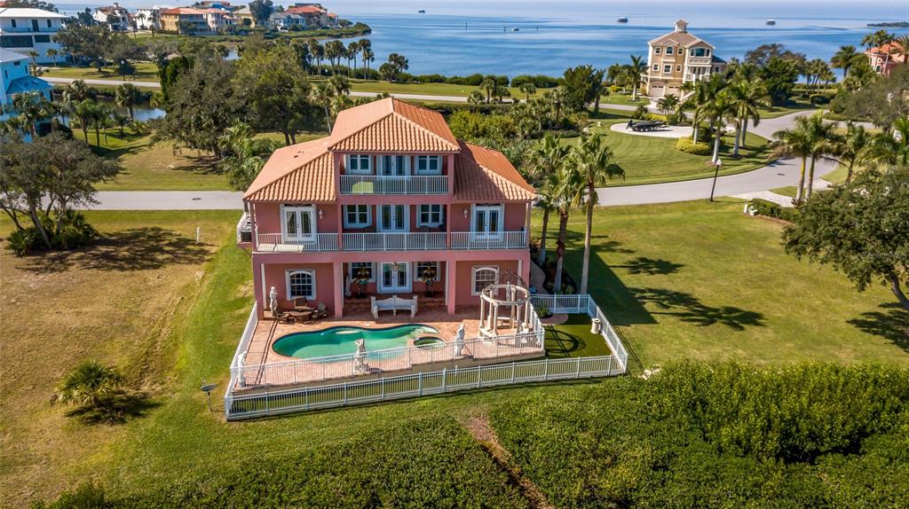 4613 Harborpointe Drive Port Richey, FL 34668 - Photo 7 of 21 an aerial view of a house with swimming pool garden and outdoor seating