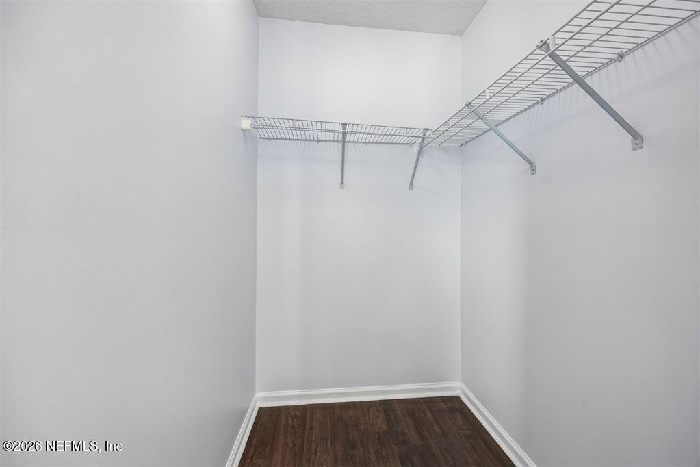 96204 Coral Reef Road Yulee, FL 32097 - Photo 26 of 40 a view of small space with racks on the wall