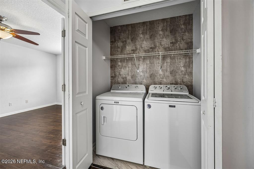 96204 Coral Reef Road Yulee, FL 32097 - Photo 31 of 40 a utility room with dryer and washer