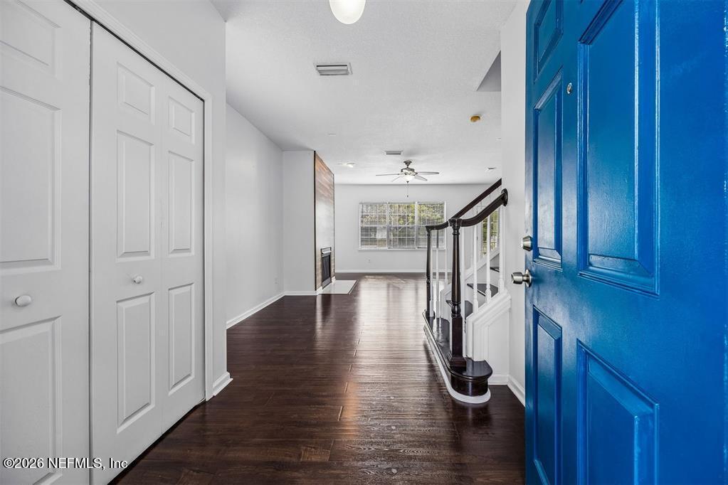 96204 Coral Reef Road Yulee, FL 32097 - Photo 6 of 40 a view of entryway with wooden floor