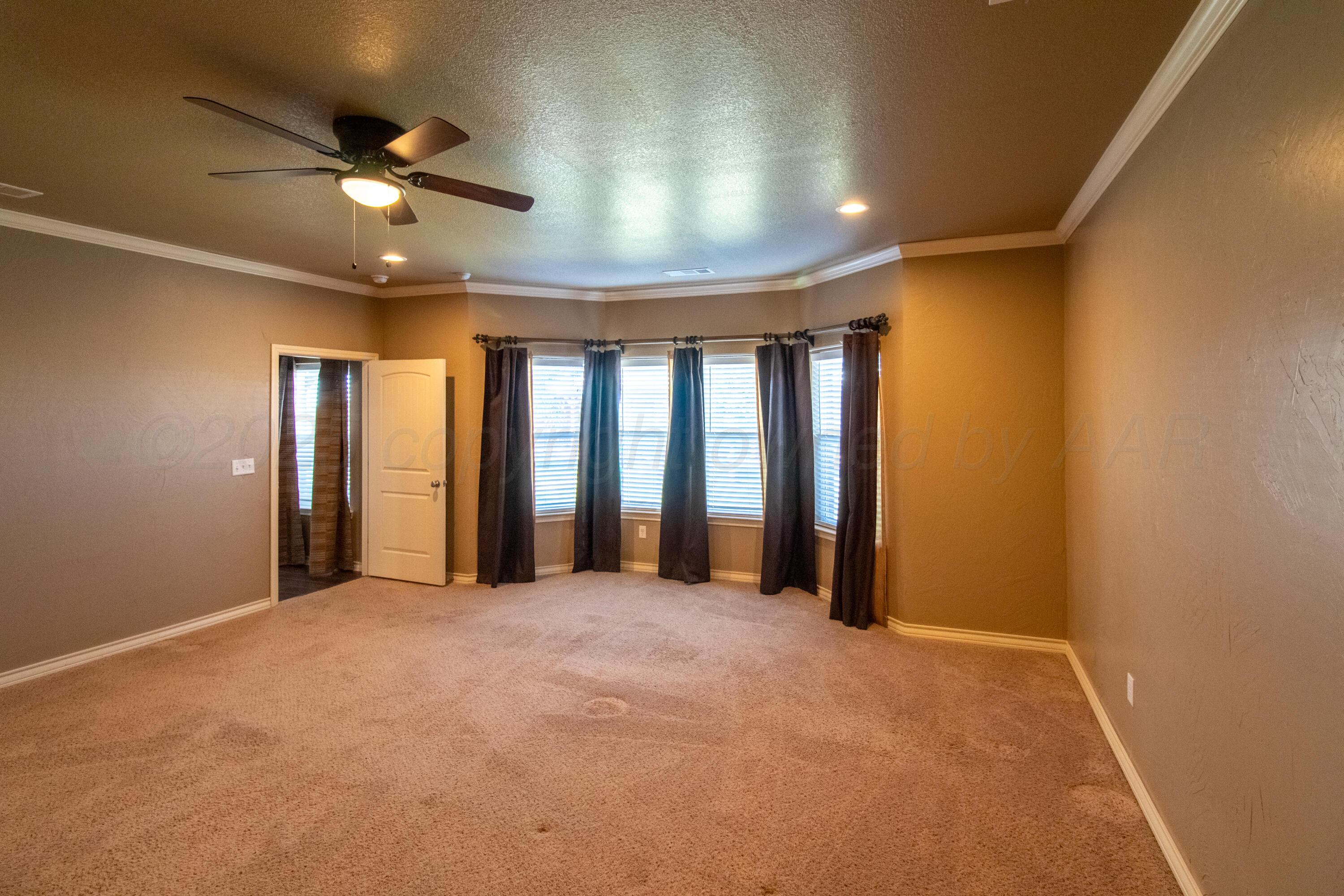 19100 Stone Creek Road Amarillo, TX 79124 - Photo 14 of 49 Spacious Primary Bedroom