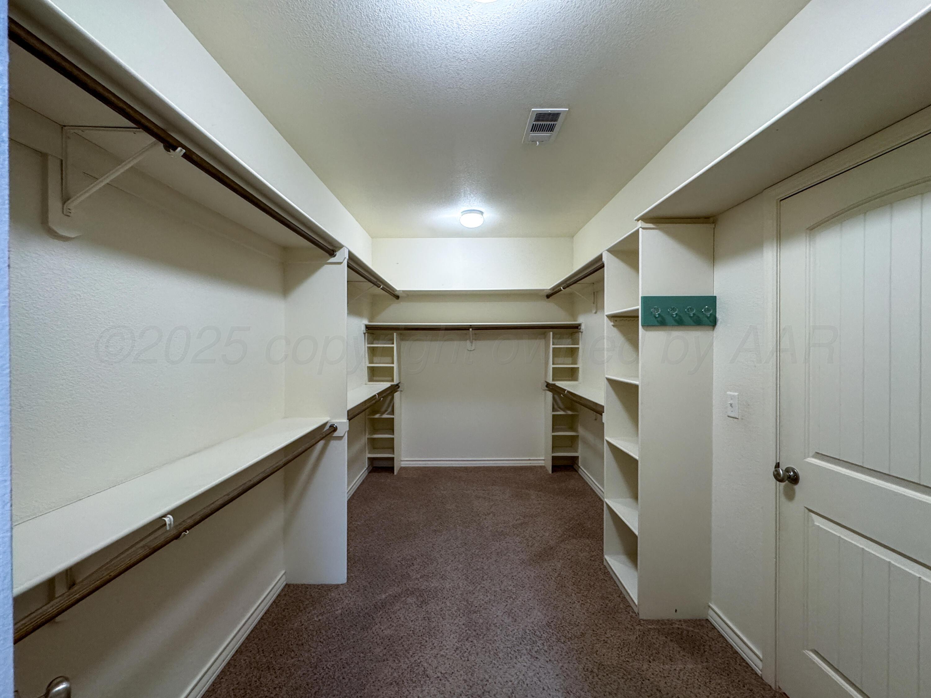19100 Stone Creek Road Amarillo, TX 79124 - Photo 18 of 49 Primary Closet