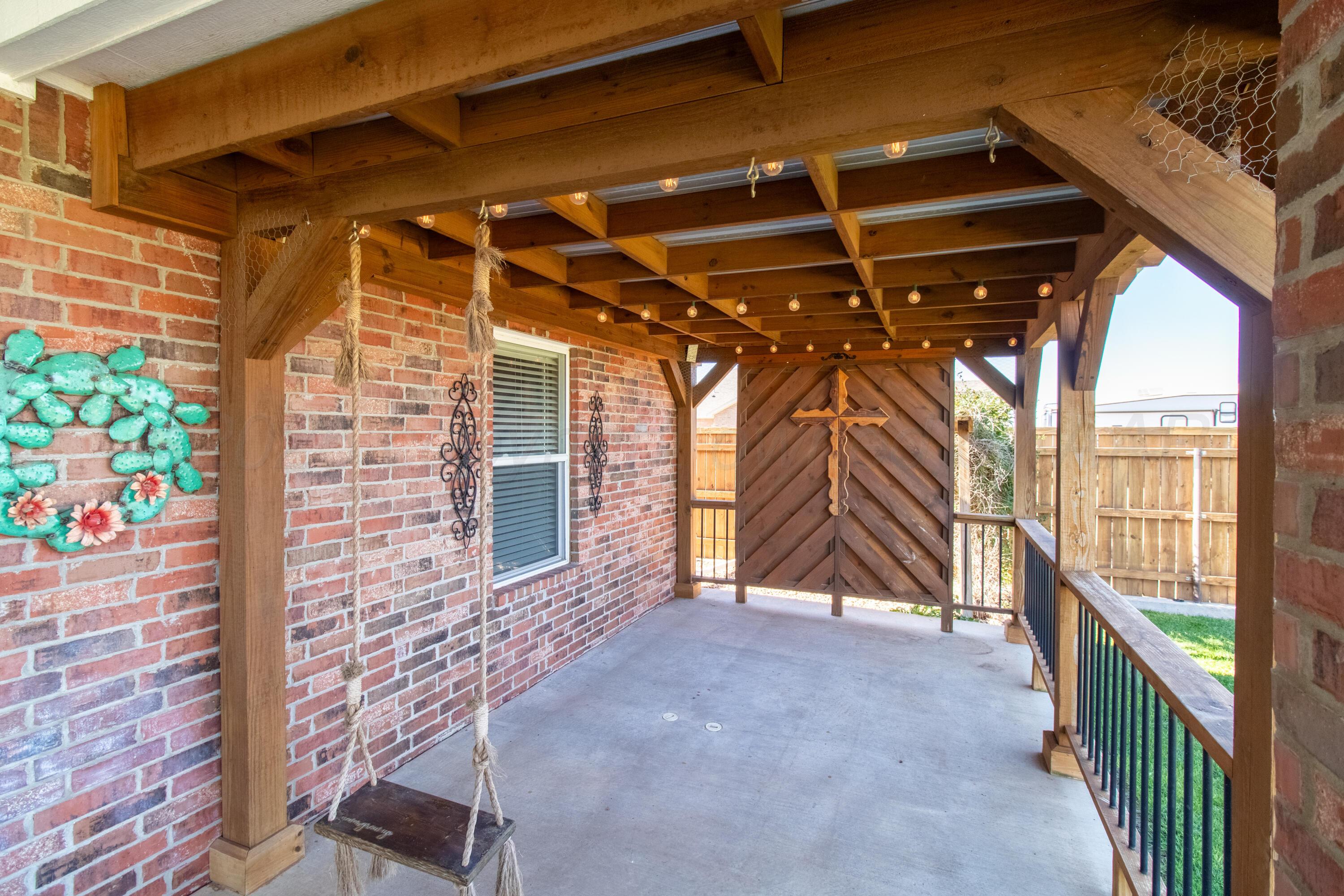 19100 Stone Creek Road Amarillo, TX 79124 - Photo 31 of 49 Back patio with custom wood work