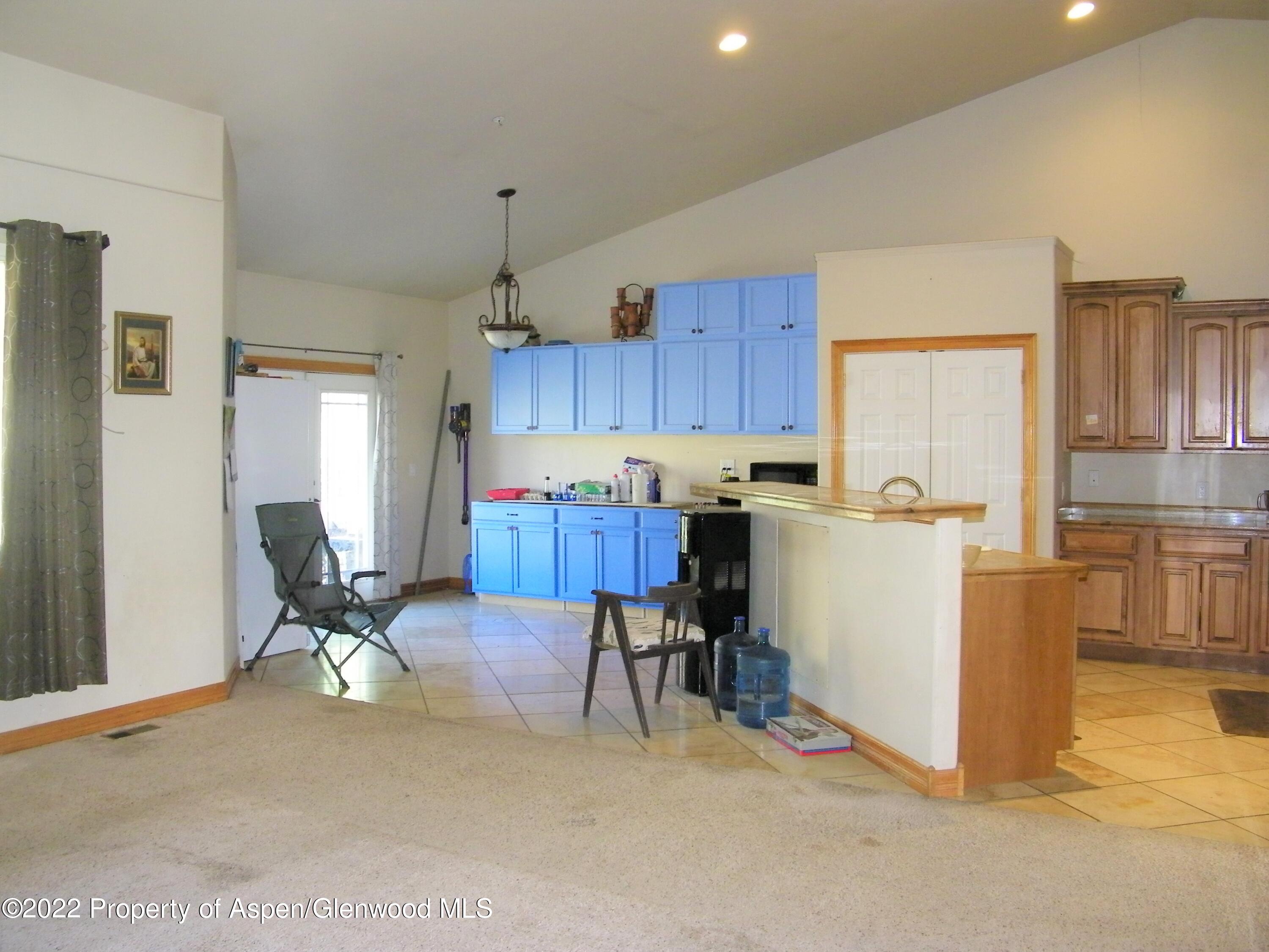 133 Native Springs Drive Rifle, CO 81650 - Photo 8 of 15 Living Room to Kitchen