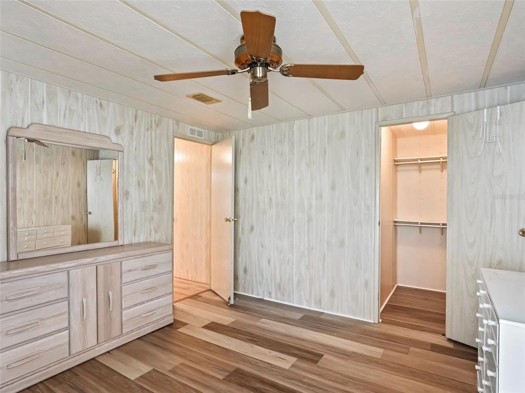 1102 Dustin Drive The Villages, FL 32159 - Photo 25 of 38 a view of a room with cabinet and windows