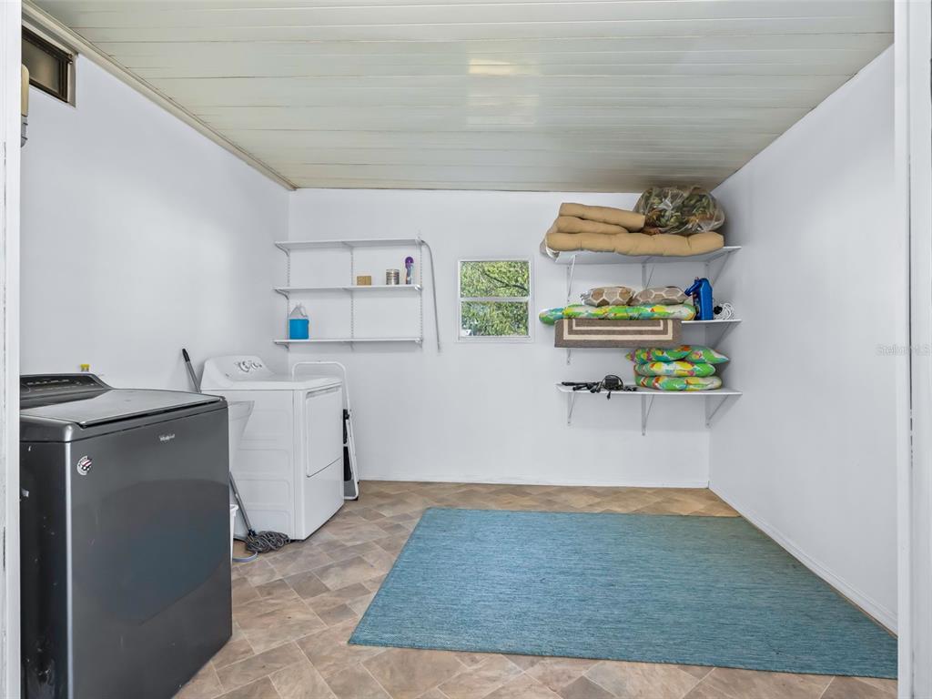 1102 Dustin Drive The Villages, FL 32159 - Photo 28 of 38 a room with storage and utility