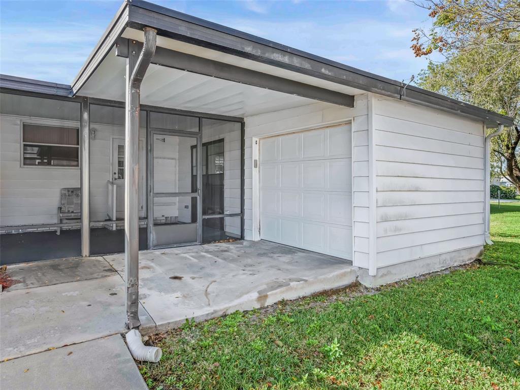 1102 Dustin Drive The Villages, FL 32159 - Photo 29 of 38 a view of front door and yard