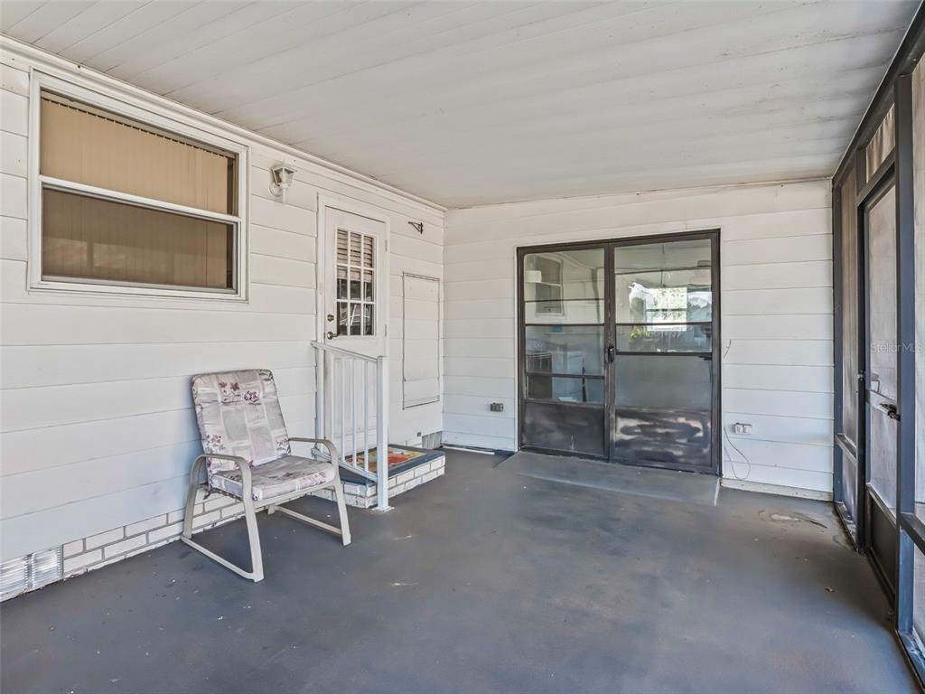 1102 Dustin Drive The Villages, FL 32159 - Photo 5 of 38 a dining room with furniture and a window
