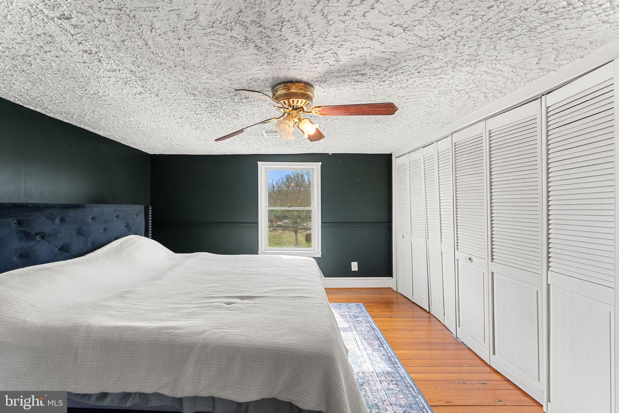 420 Russell Road Berryville, VA 22611 - Photo 38 of 60 Serene bedroom with natural light.