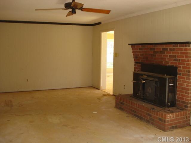 345 Pine Valley Road Salisbury, NC 28147 - Photo 3 of 9 a view of an empty room and fire place