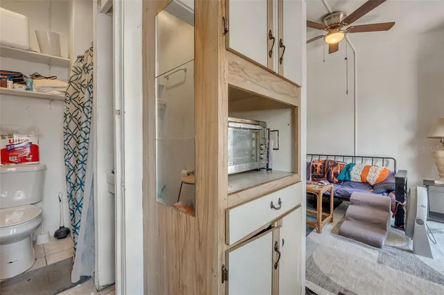 a bedroom with two beds and a window