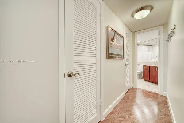 a view of closet area with empty racks