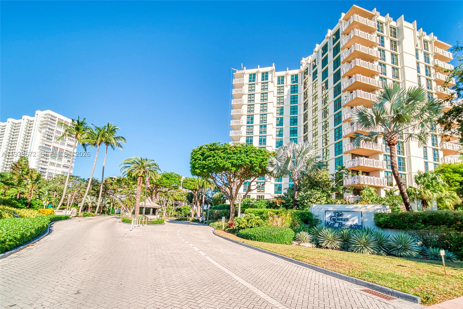 1111 Crandon Boulevard, Unit C404 Key Biscayne, FL 33149 - Photo 2 of 44 a view of building with garden