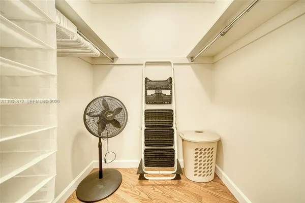 a balcony view with couple of chairs