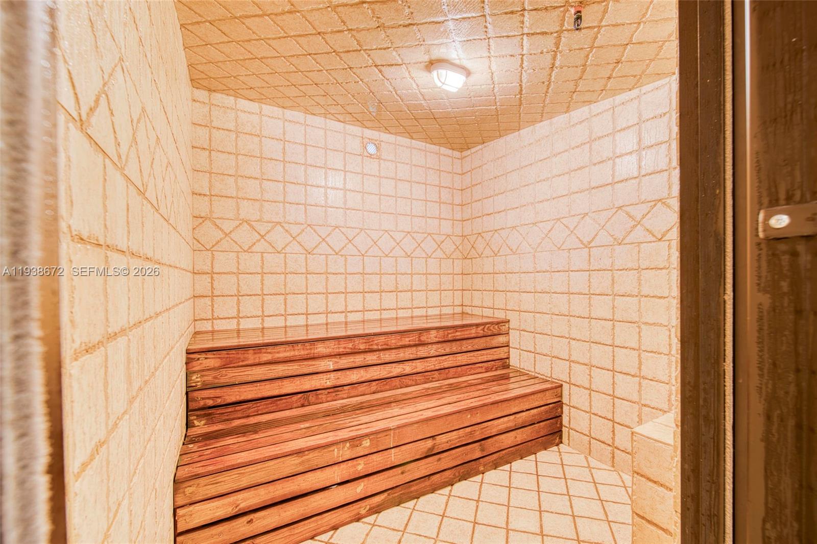 1111 Crandon Boulevard, Unit C404 Key Biscayne, FL 33149 - Photo 30 of 44 a bathroom with a shower