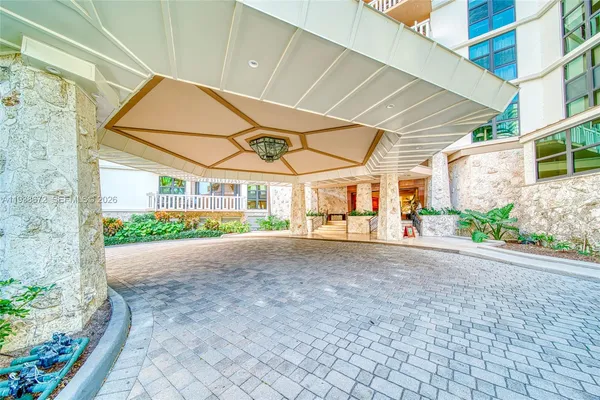 a view of a living room with a flat screen tv