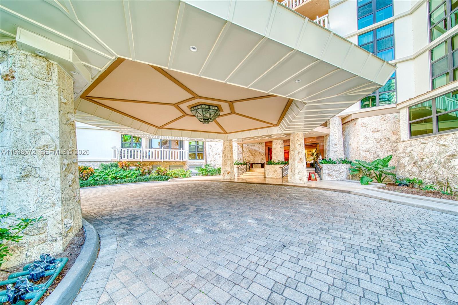 1111 Crandon Boulevard, Unit C404 Key Biscayne, FL 33149 - Photo 3 of 44 a view of porch and yard