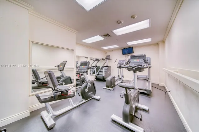 a room with lots of furniture and clutter