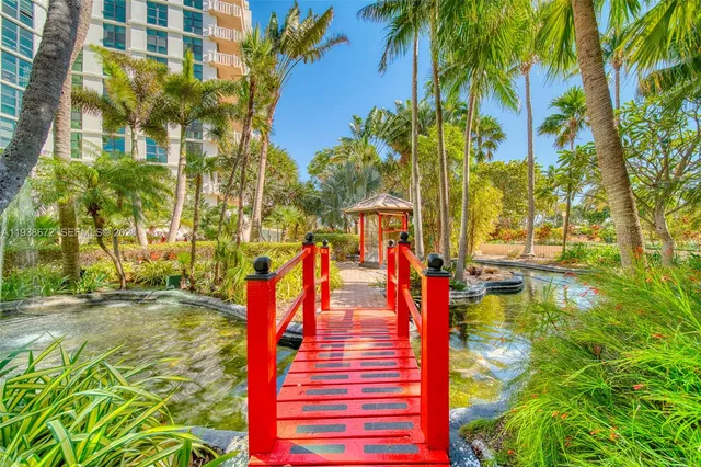 a view of a swimming pool with a lounge chairs