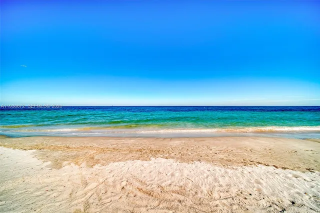 a view of a city with tall buildings