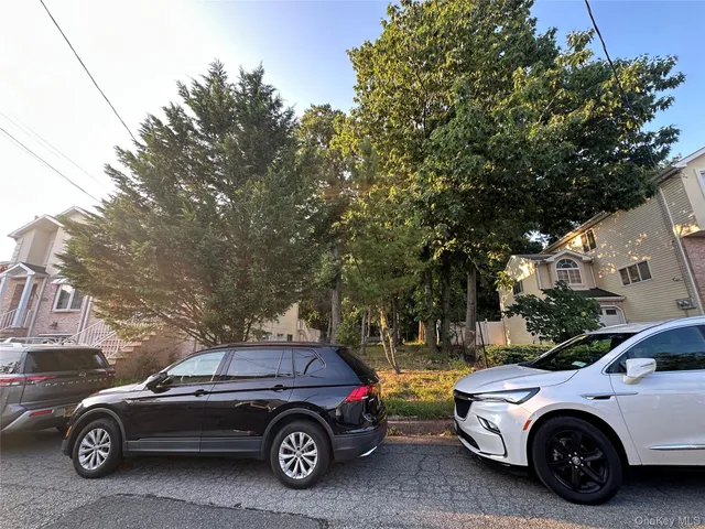 a car parked in front of a house