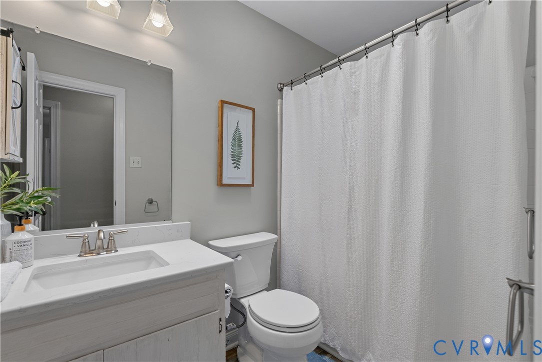 14308 Chimney House Road Midlothian, VA 23112 - Photo 35 of 52 Bathroom featuring a white vanity with an integrat