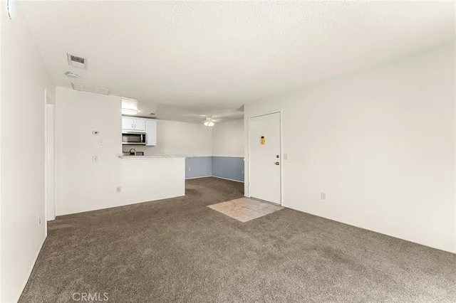 a view of balcony with wooden floor