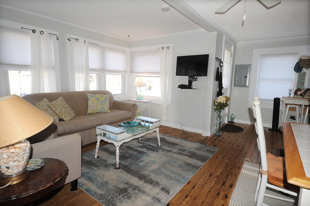 1 Circle Drive Wareham, MA 02571 - Photo 6 of 20 a living room with furniture and a flat screen tv