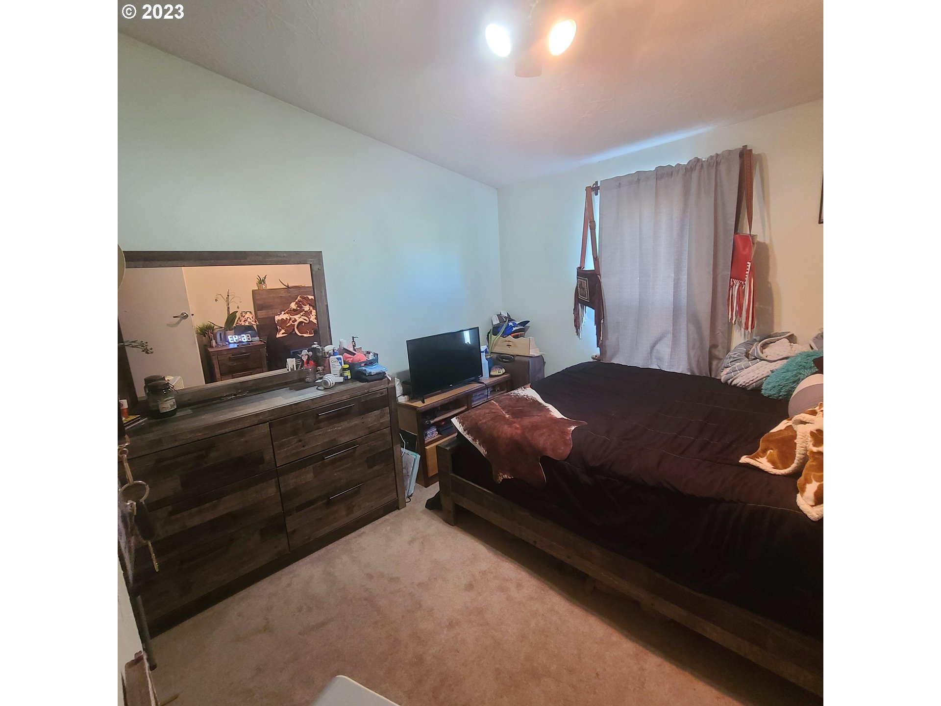 70775 Middle Road Elgin, OR 97827 - Photo 24 of 40 a bedroom with a bed and window