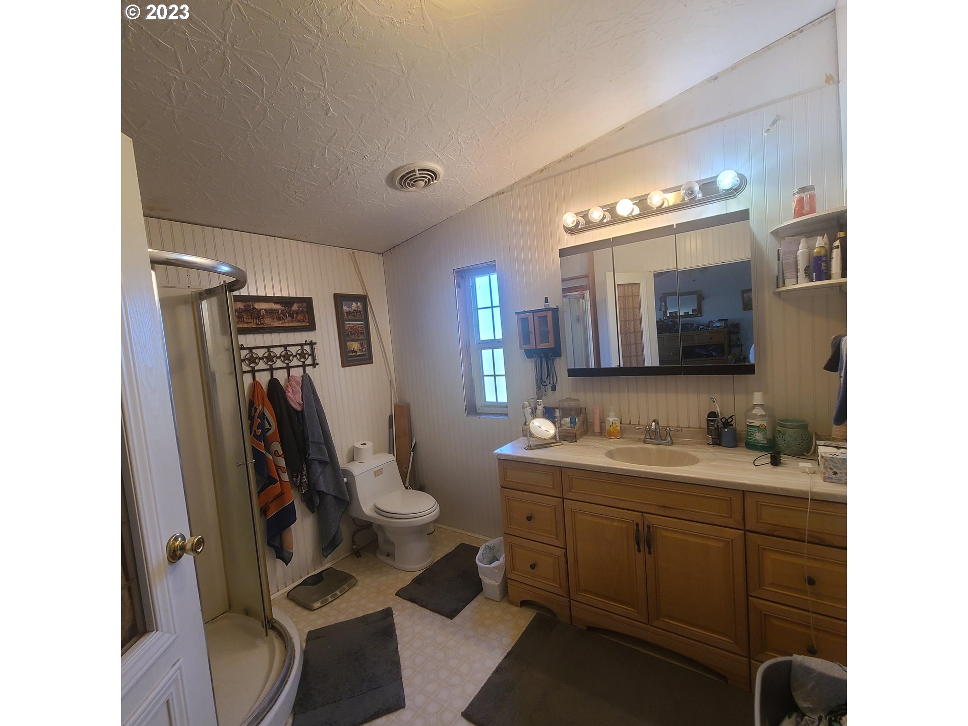 70775 Middle Road Elgin, OR 97827 - Photo 29 of 40 a bathroom with a toilet sink and mirror