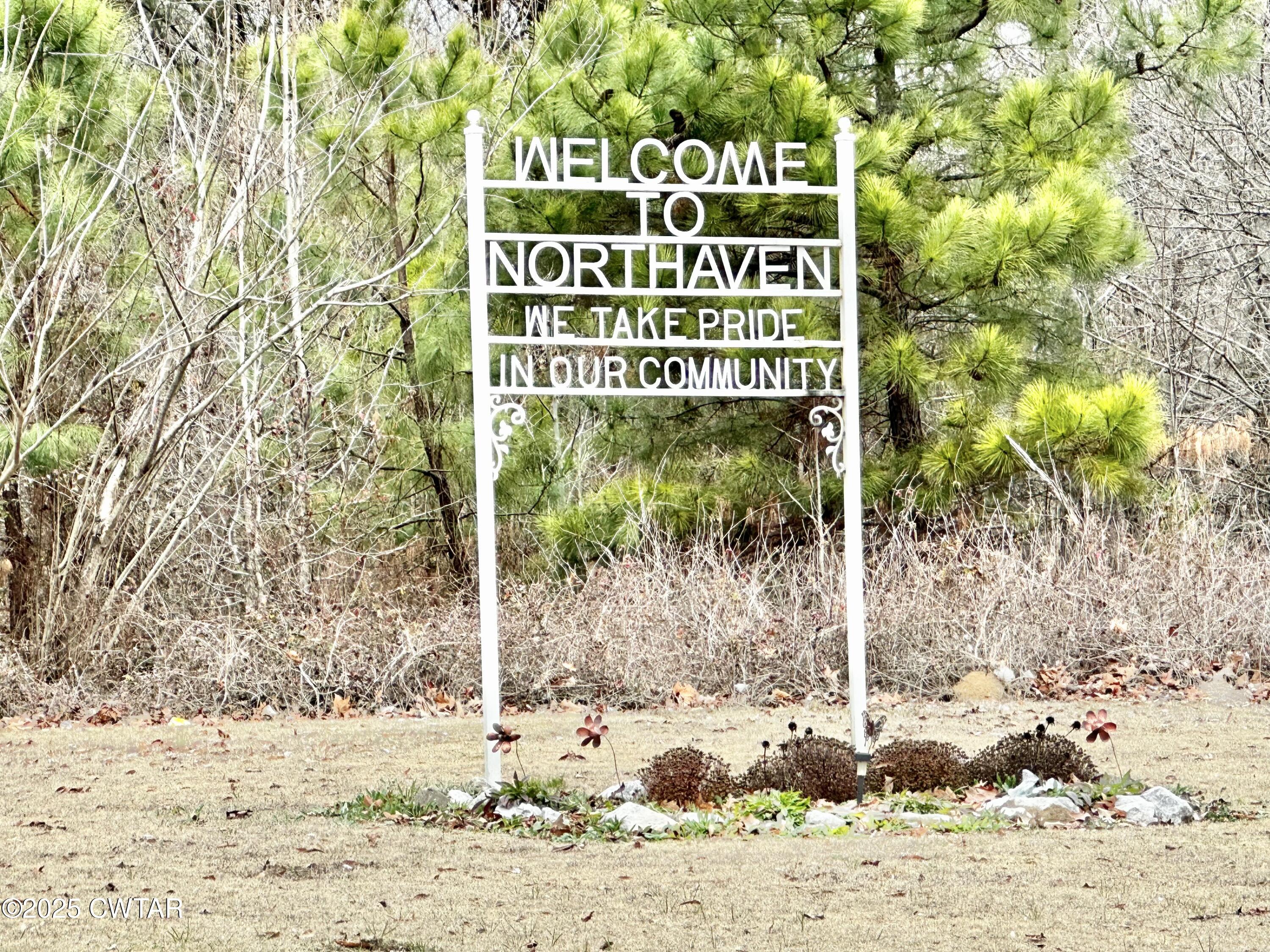 980 North Circle Road Memphis, TN 38127 - Photo 2 of 30 a sign on the side of a road