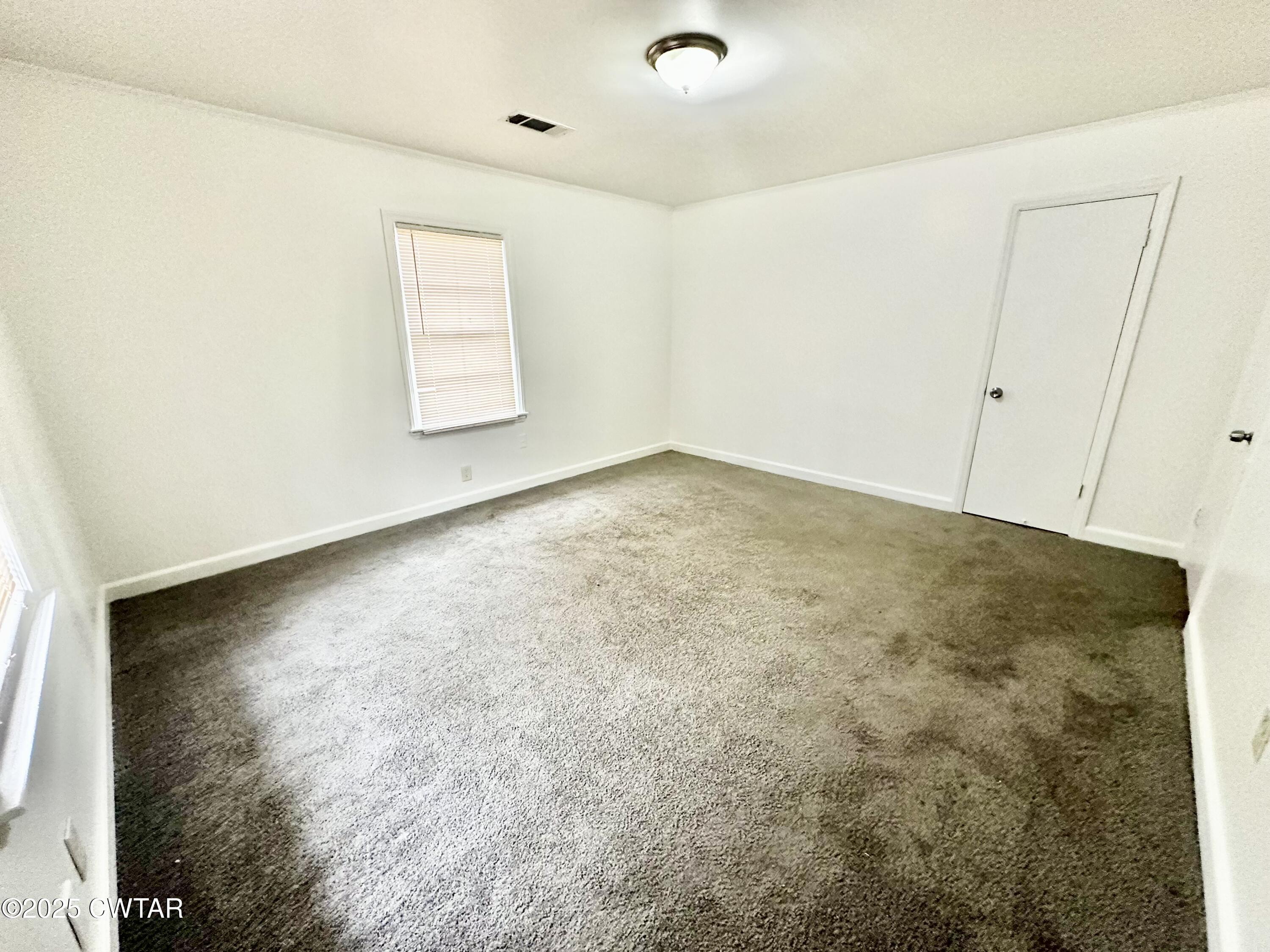 980 North Circle Road Memphis, TN 38127 - Photo 21 of 30 an empty room with windows