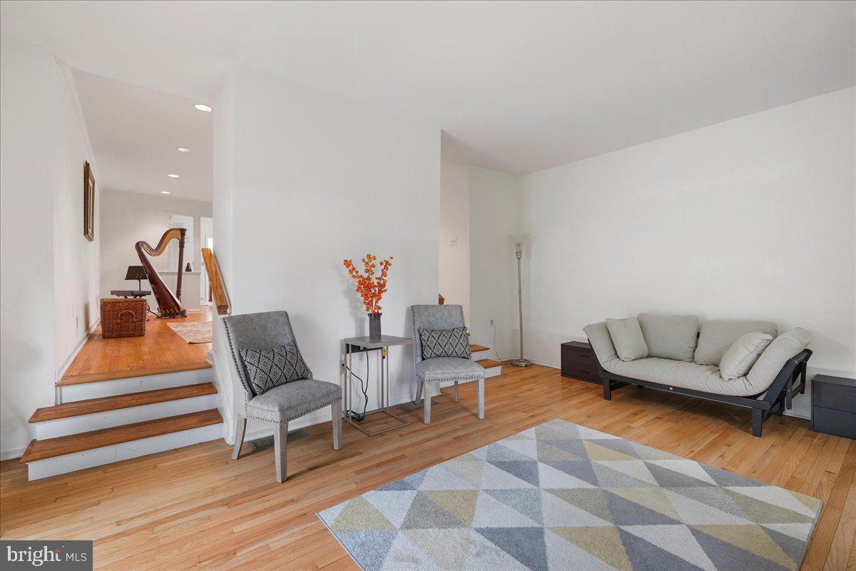 59 Longview Drive Princeton, NJ 08540 - Photo 12 of 30 a living room with furniture and a wooden floor