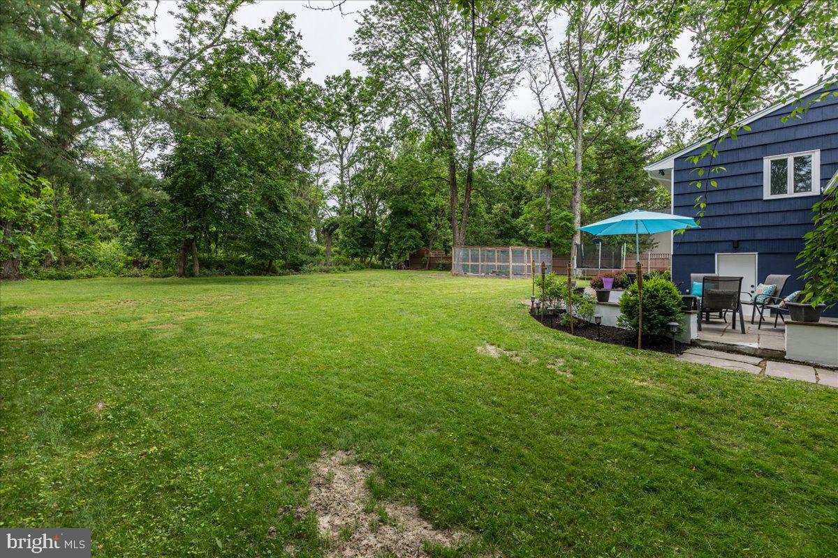 59 Longview Drive Princeton, NJ 08540 - Photo 27 of 30 a view of a patio with a garden