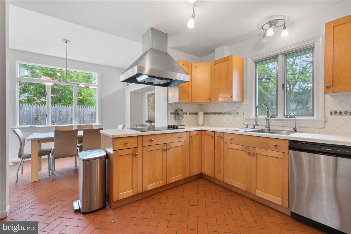 59 Longview Drive Princeton, NJ 08540 - Photo 7 of 30 a kitchen with stainless steel appliances granite countertop a sink a stove and a refrigerator