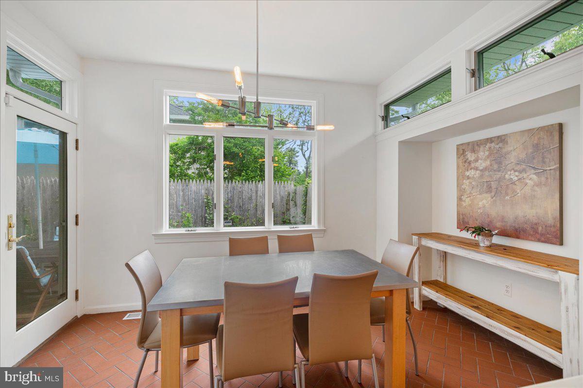 59 Longview Drive Princeton, NJ 08540 - Photo 10 of 30 a view of a dining room with furniture window and outside view