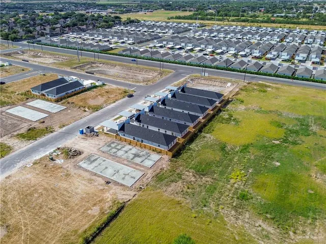 a view of a swimming pool and an outdoor space