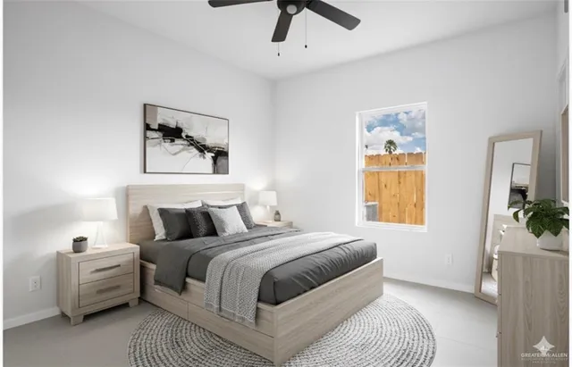 a bedroom with bed and window