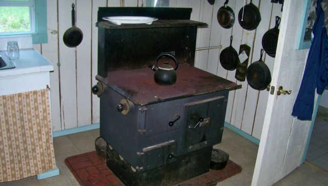 11x12 kitchen has a wood stove