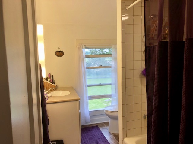 14964 Mill Road Capron, IL 61012 - Photo 17 of 25 a bathroom with a sink and a shower