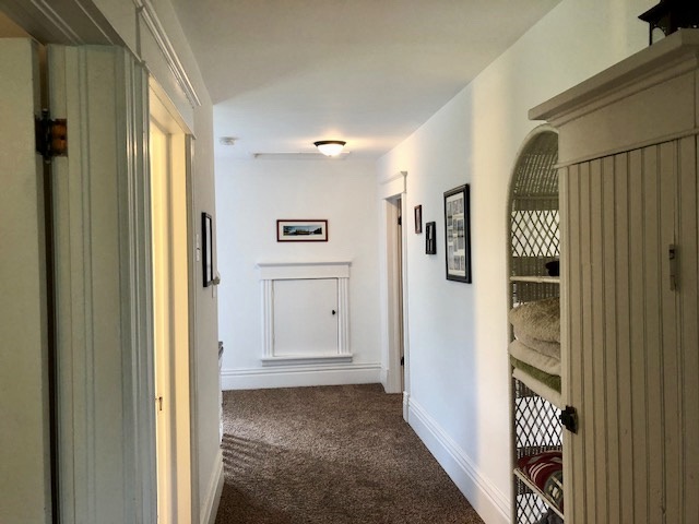 14964 Mill Road Capron, IL 61012 - Photo 19 of 25 a view of a hallway with wooden floor and entryway