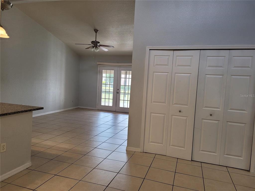 155 North Pearl Lake Causeway, Unit 200 Altamonte Springs, FL 32714 - Photo 13 of 21 an empty room with windows and cabinet