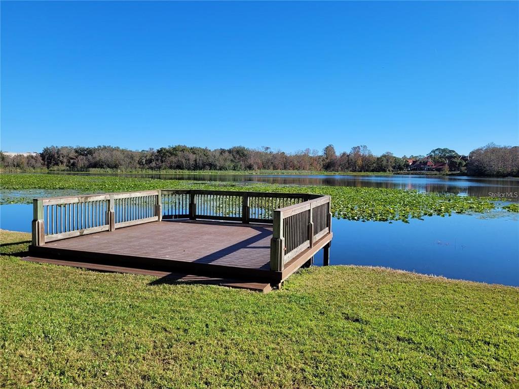 155 North Pearl Lake Causeway, Unit 200 Altamonte Springs, FL 32714 - Photo 19 of 21 a view of a lake with a garden and lake view