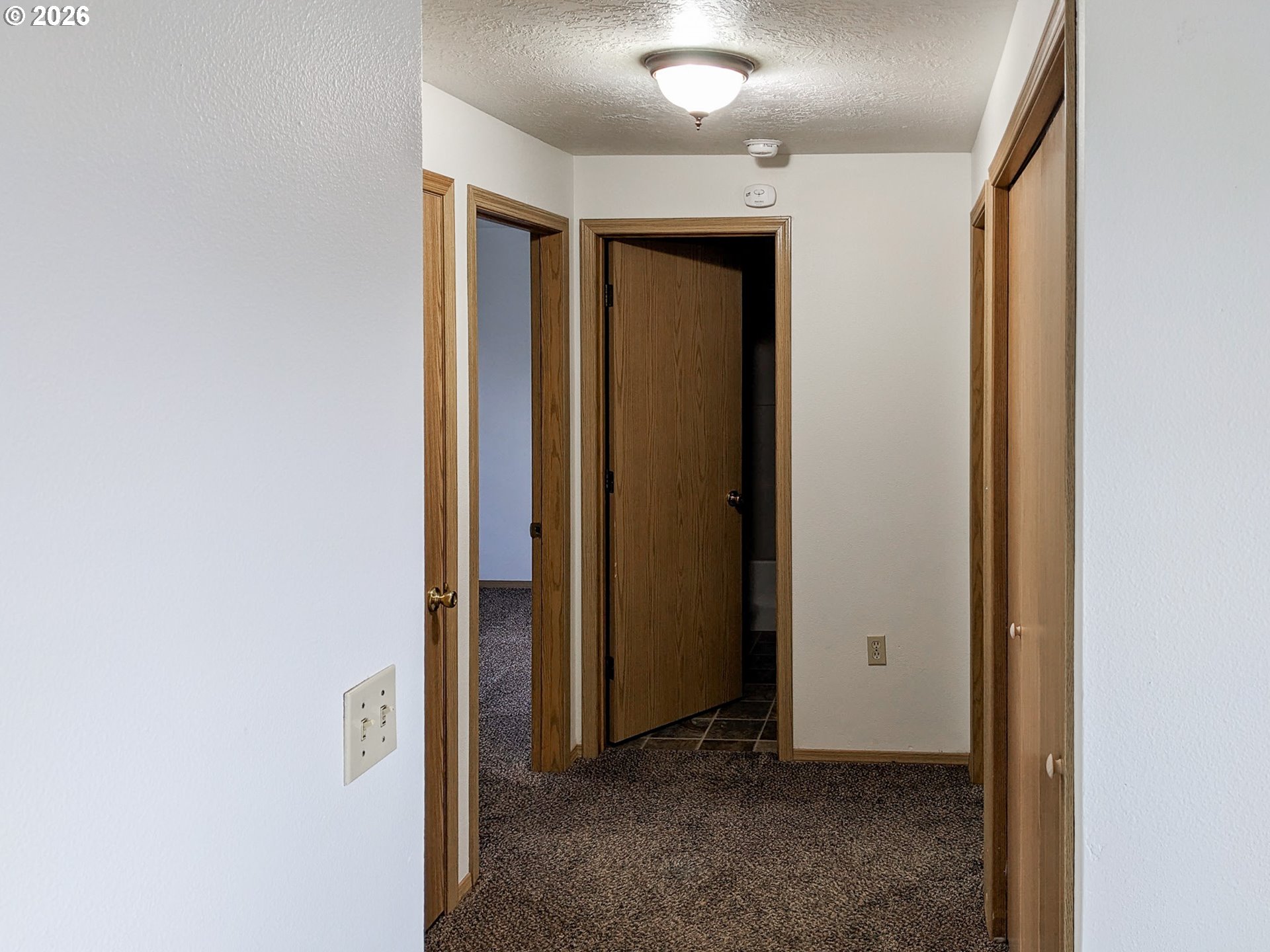 224 C Street Independence, OR 97351 - Photo 11 of 36 a view of hallway with closet