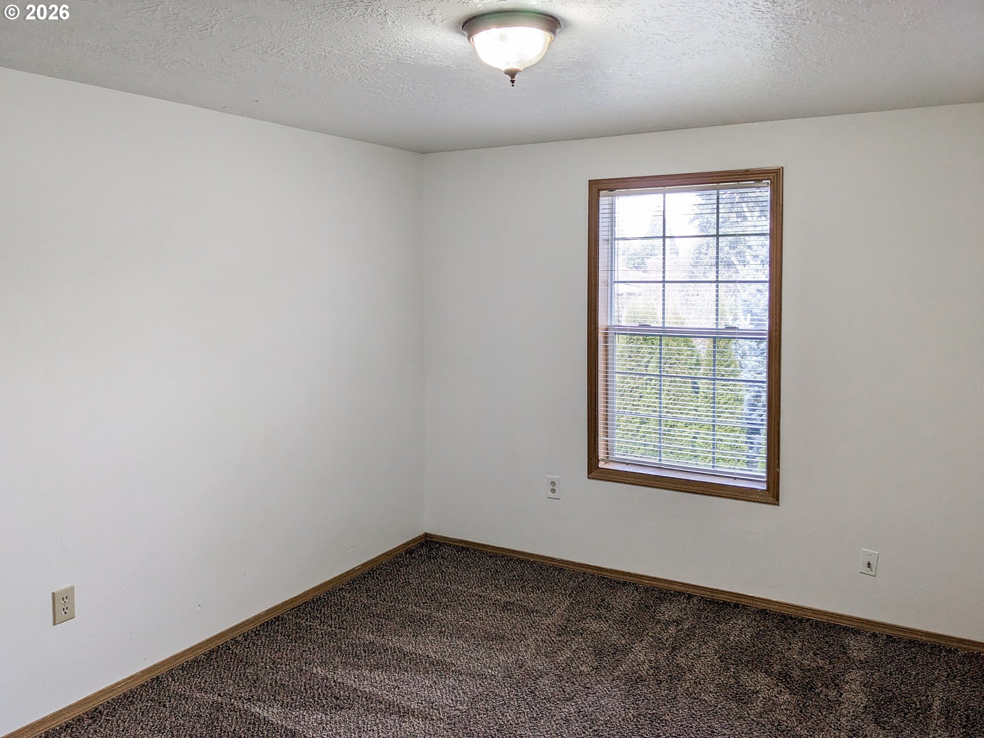 224 C Street Independence, OR 97351 - Photo 13 of 36 an empty room with windows