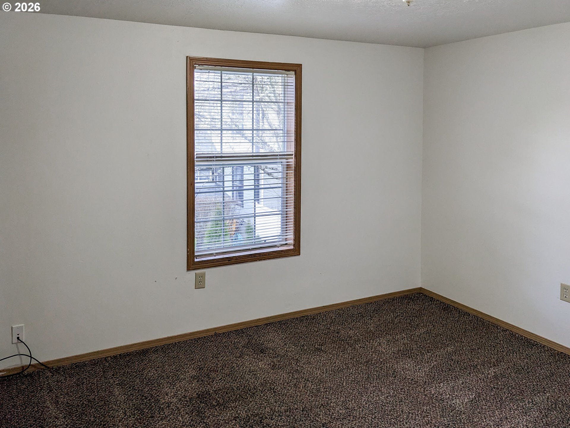 224 C Street Independence, OR 97351 - Photo 15 of 36 an empty room with a window