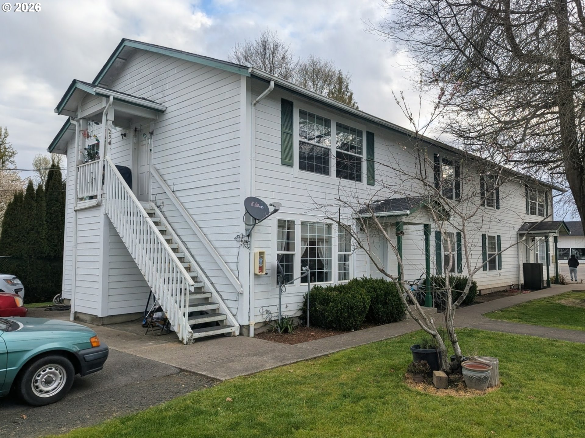 224 C Street Independence, OR 97351 - Photo 3 of 36 a house view with a garden space